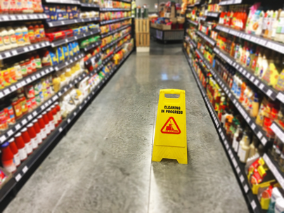 Caution wet floor sign in business