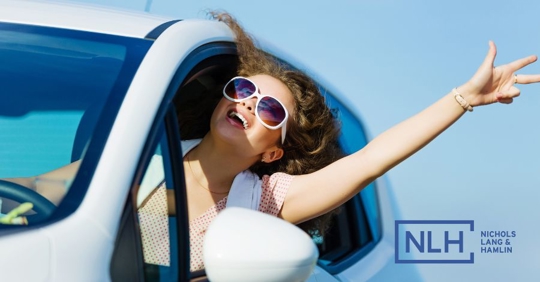 woman driving on a summer day
