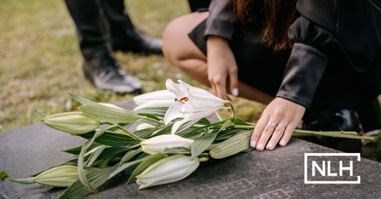 family on a grave